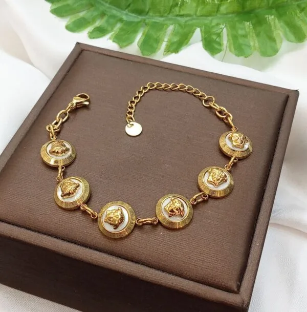 White Versace gold plated  bracelet