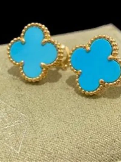 Light blue vancleef gold plated earrings