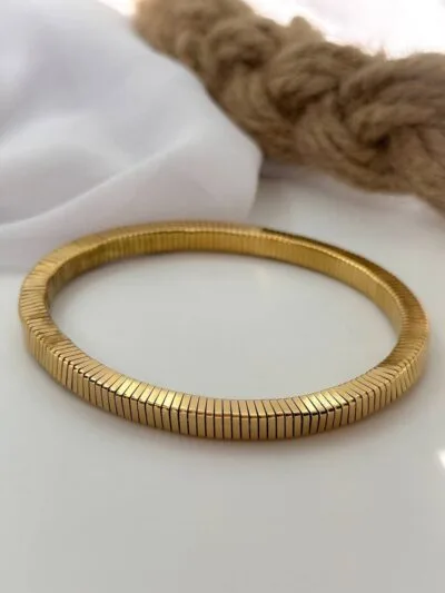 Bold Elastic gold plated bangle