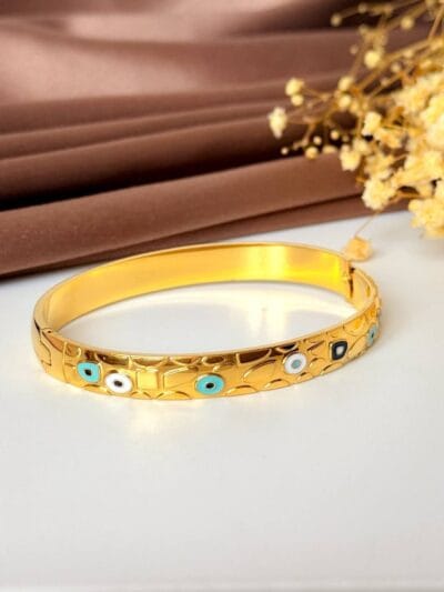 Circles gold plated bangle