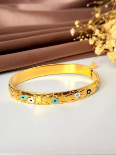 Circles gold plated bangle