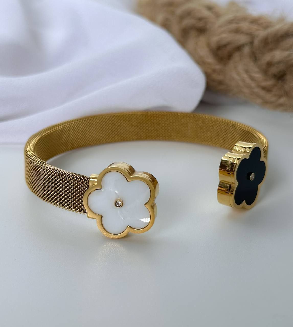 Black & white gold plated bangle