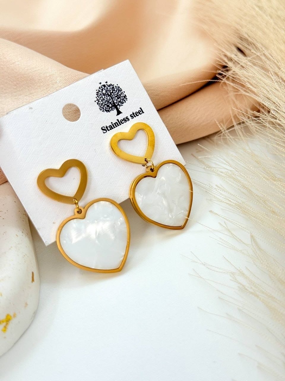 White heart gold plated earrings